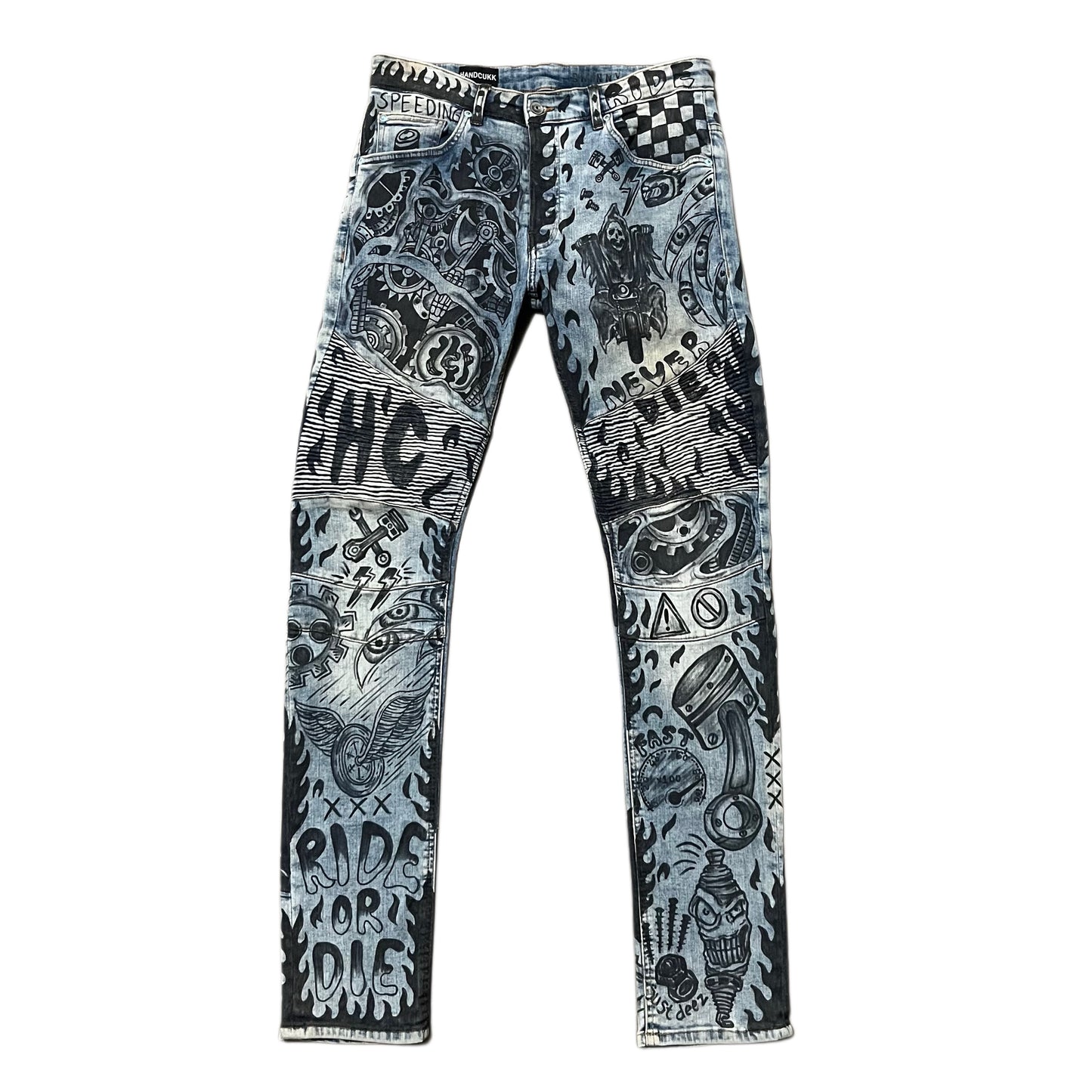 Blue jeans with black graphic designs on a white background