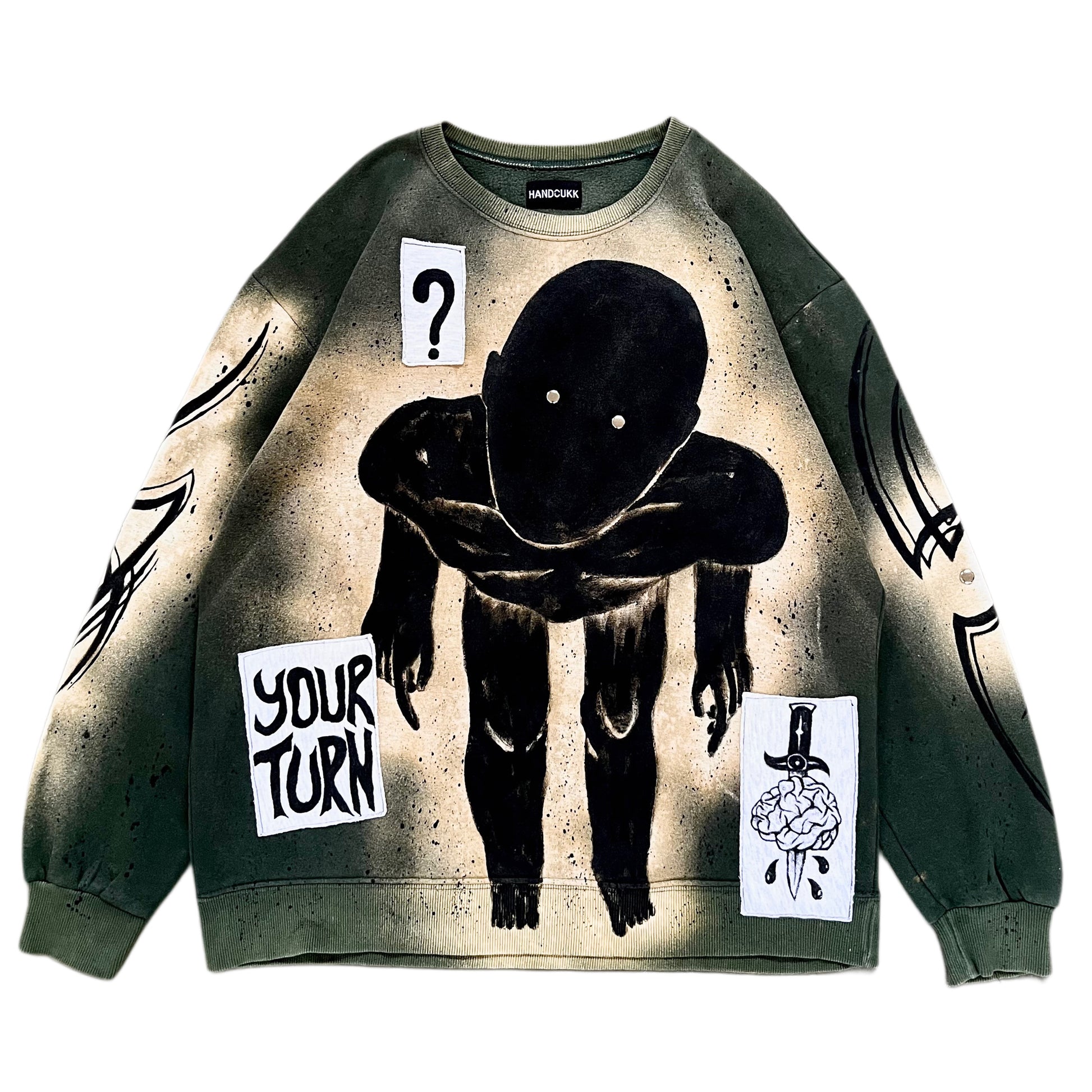 Sweatshirt with graphic design and text on a white background