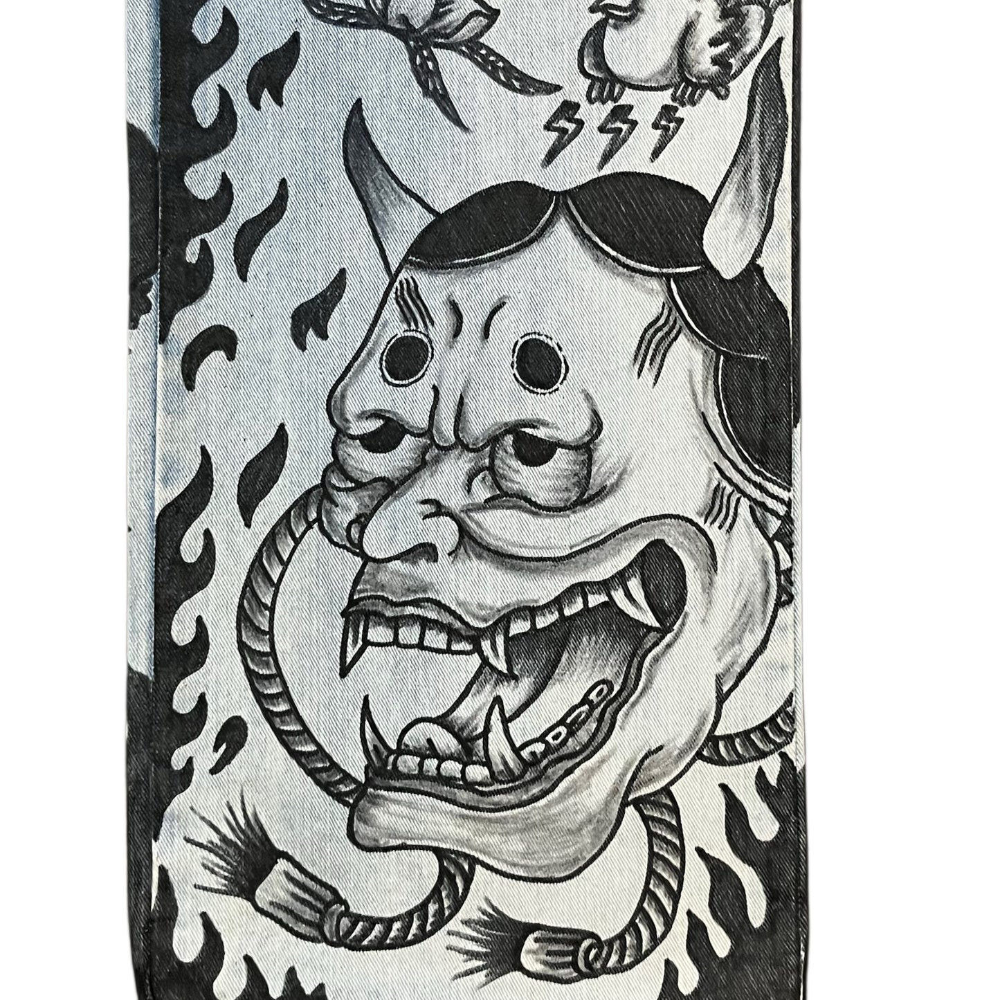 Black and white illustration of a demon face with flames and other elements on a phone case.